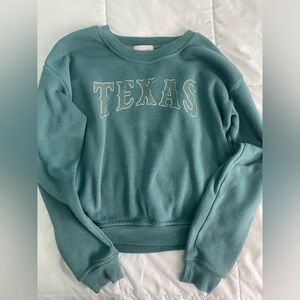 Medium crew neck with “Texas” lettering